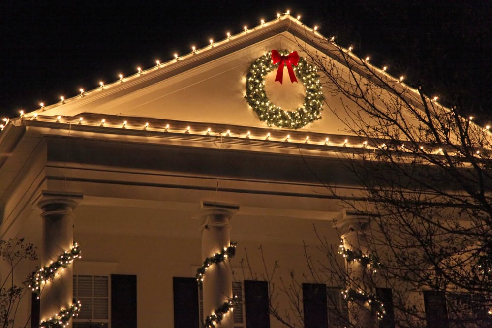 Festive Christmas lights on a Keller TX home at dusk