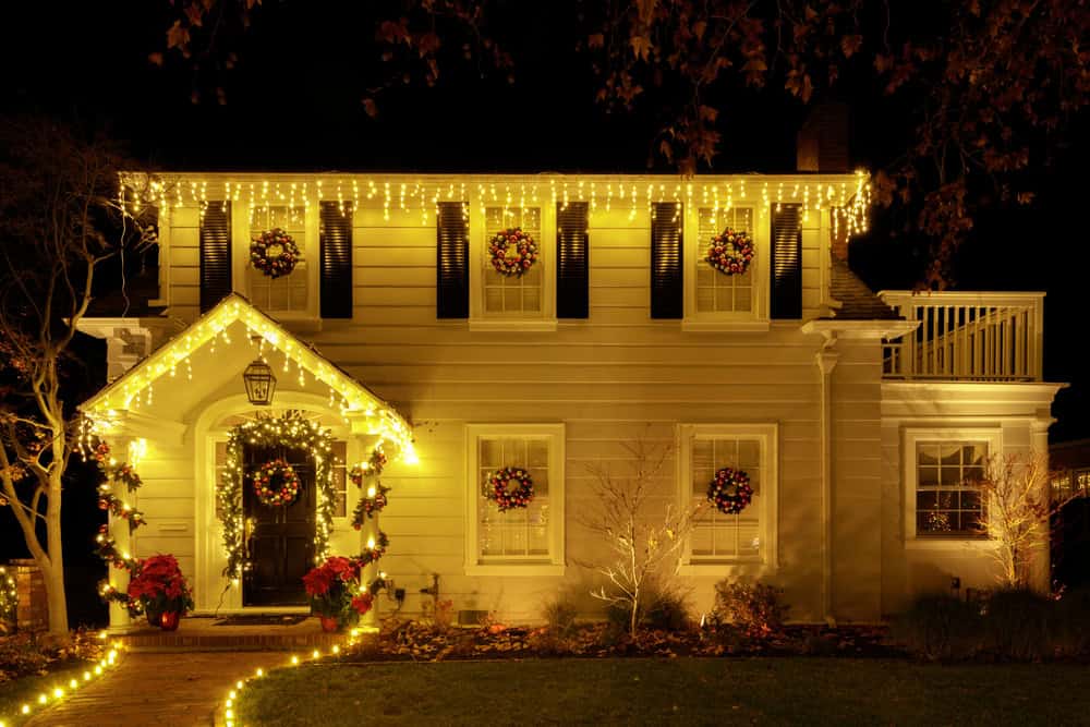 Custom holiday lighting installed across a Keller property